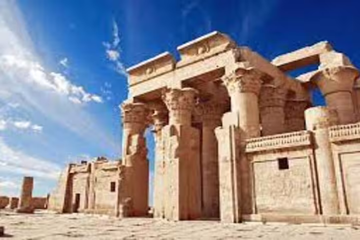 Kom Ombo Temple columns under blue sky, Nile Valley stop on Luxor to Abu Simbel, Edfu and Kom Ombo tour