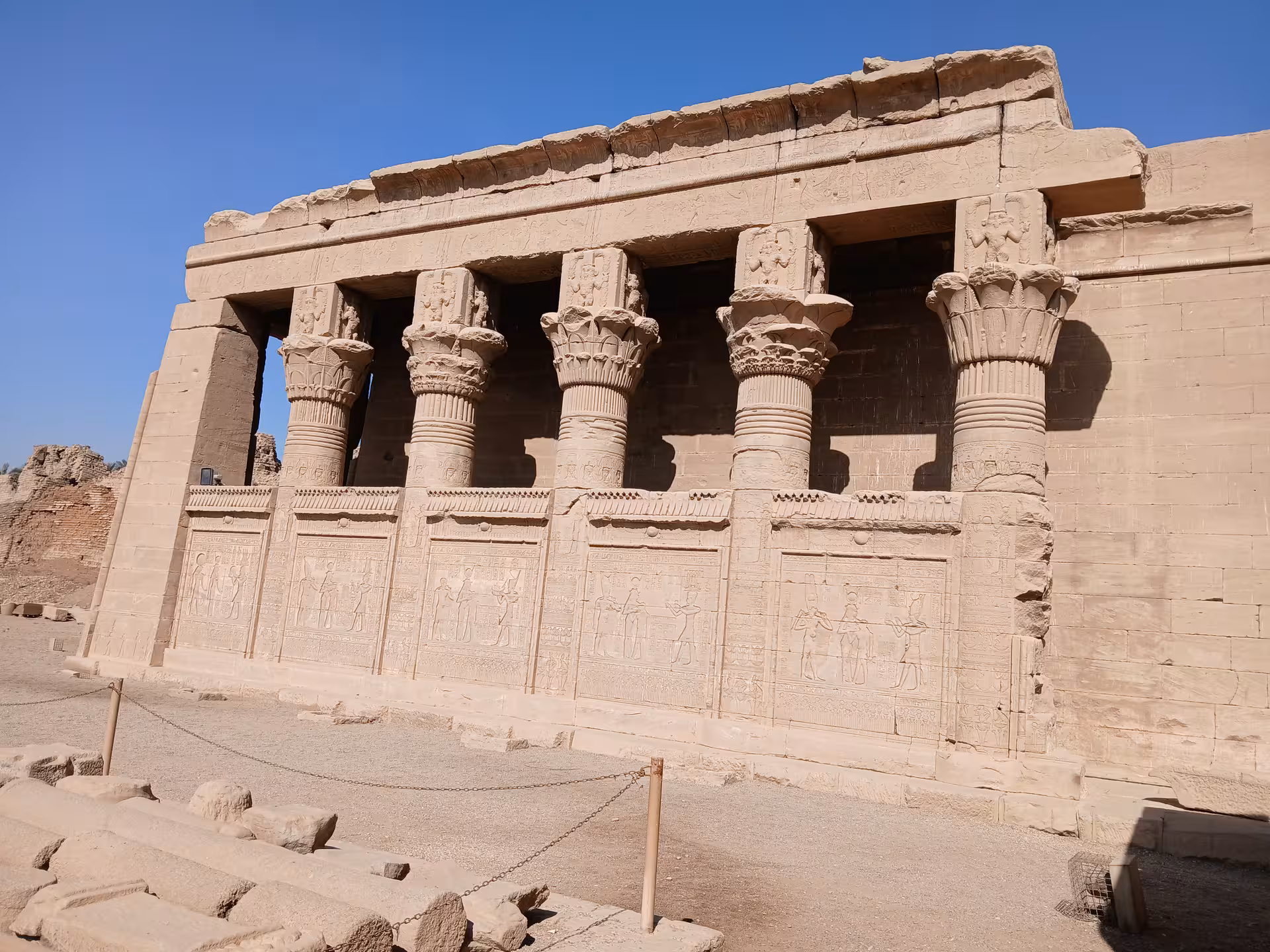 Daytime view of exquisite Kom Ombo Temple with detailed hieroglyphics and grand columns, ideal for Nile explorations.