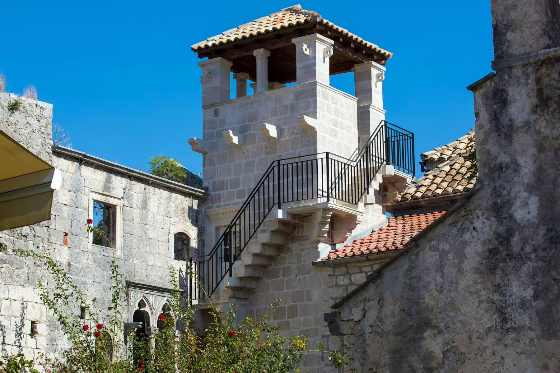 Stone tower and stairs in Korcula Old Town, a highlight of the Legends of Peljesac & Korcula tour from Dubrovnik