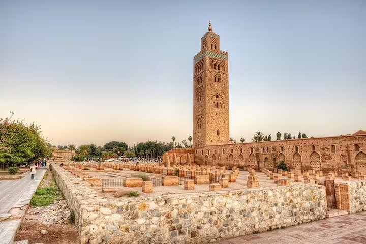 Koutoubia Mosque minaret in Marrakech at sunset, a highlight on Morocco 9 days tour from Tangier