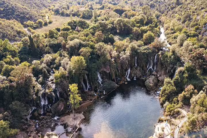 Drone panorama of Kravice Waterfalls swimming pool and cascades, highlight of Mostar day trip