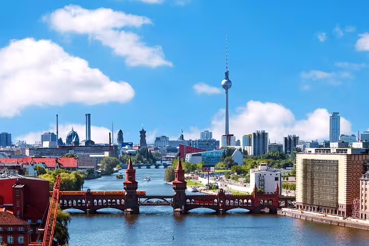 Berlin skyline with Oberbaumbridge over Spree River and Fernsehturm TV Tower on a sunny day