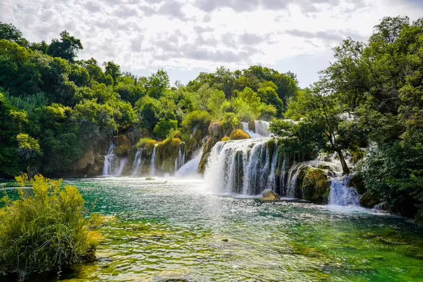 Krka Waterfalls private tour view of cascading falls and emerald pools in Krka National Park, Croatia