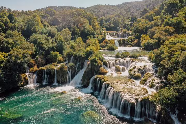 Panoramic cascades of Krka Waterfalls in Krka National Park, Croatia on a private day trip with wine tasting