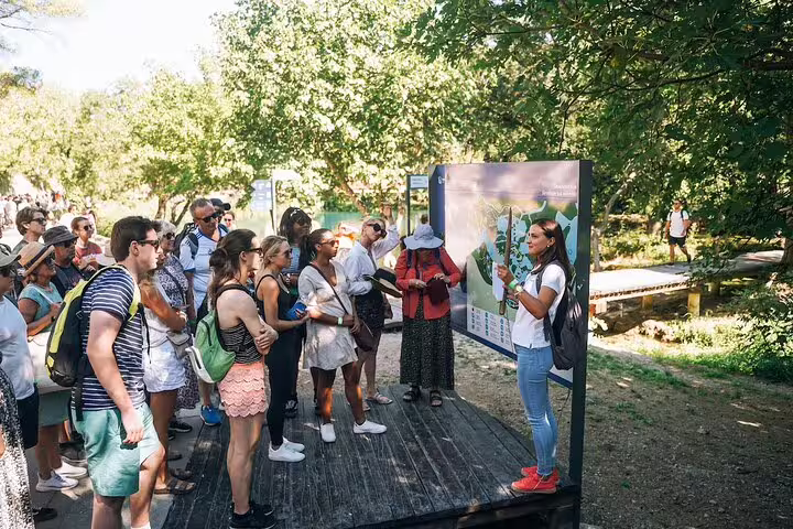 Guide briefing guests at Krka National Park entrance on a private Krka Waterfalls tour from Split