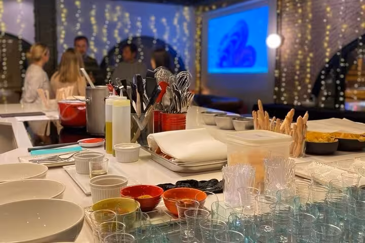 Elegant setup of bowls and utensils ready for a premium cooking class at La Boqueria Market tour in a designer loft.