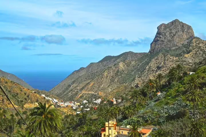 Scenic landscape of La Gomera with lush green valleys and majestic mountains, ideal for an island tour from Tenerife.