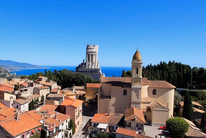 Aerial view of La Turbie village with Trophy of Augustus monument and Mediterranean Sea on French Riviera