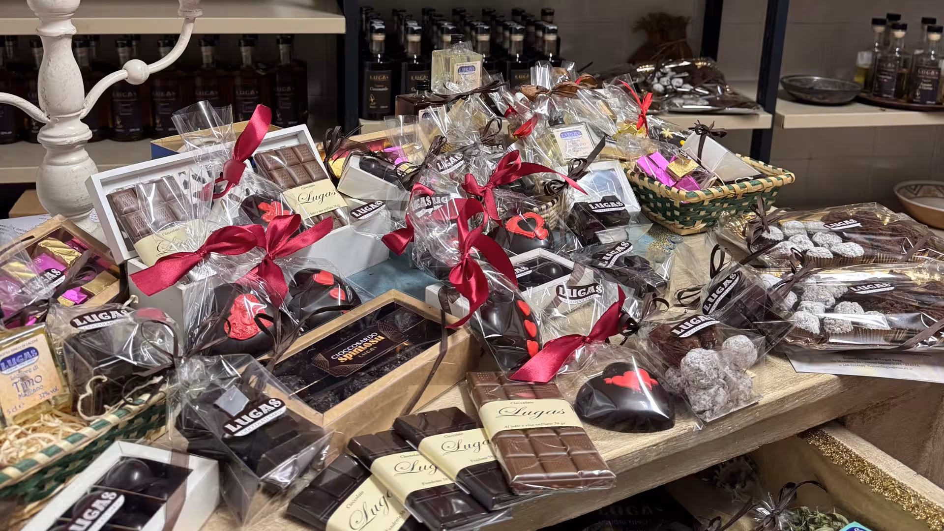 Assorted gourmet chocolates elegantly packaged for Laconi tasting experience, showcasing local flavors.