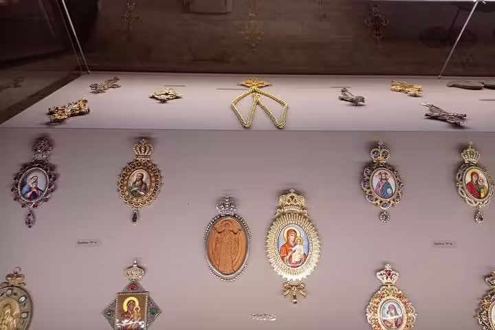 Display of ornate religious icons at Lady of the Angels Monastery, highlighting intricate craftsmanship and cultural heritage.