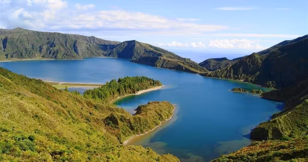 Panoramic view of Lagoa do Fogo crater lake, São Miguel Azores, on a full-day guided walking tour hike
