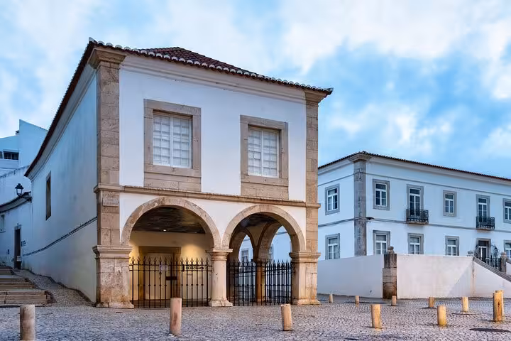Historic building with arches in Lagos, perfect for exploring on a Hello Lagos guided city walk.