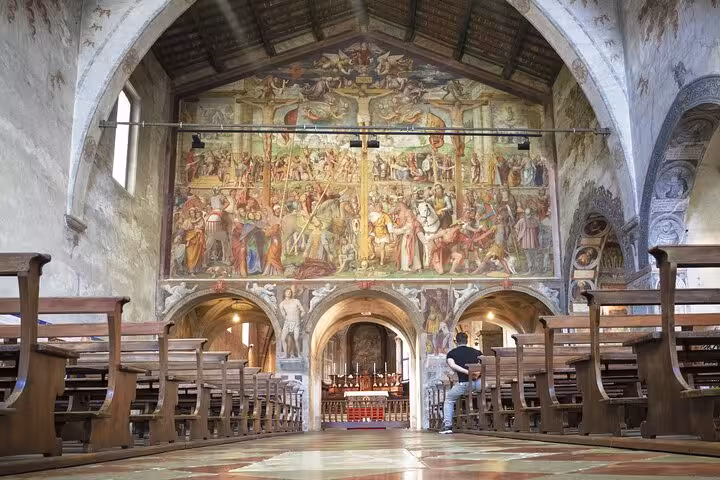 Fresco-filled church interior near Lake Como on Milan to Como Bellagio and Lugano Royal Cruise tour