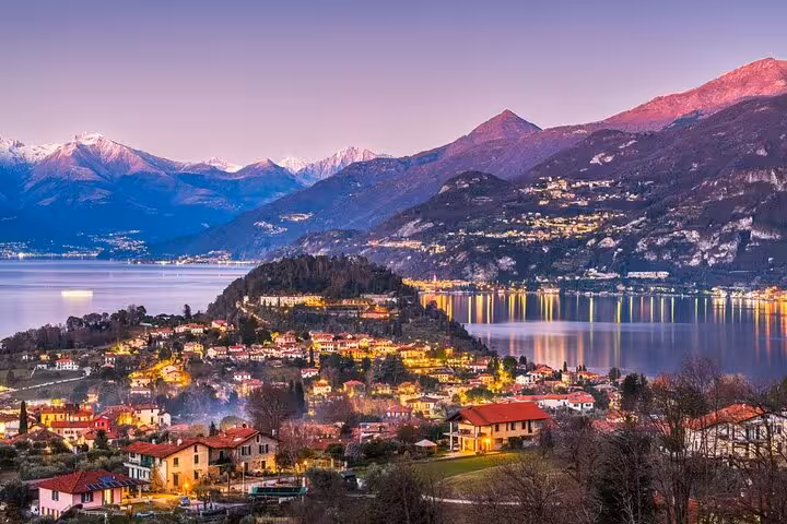 Lake Como sunset panorama near Bellagio, Italy, on Milan day trip with Lugano cruise and Alps views