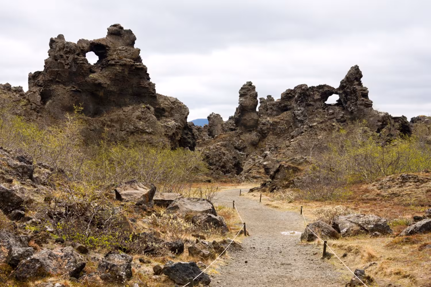 Dimmuborgir lava rock formations with walking path at Lake Myvatn, Iceland