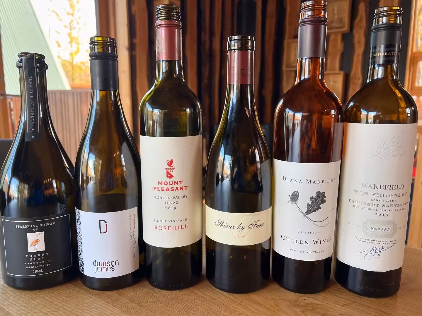 Curated selection of premium Australian red and white wines for an expert-guided lakeside wine tasting food pairing experience