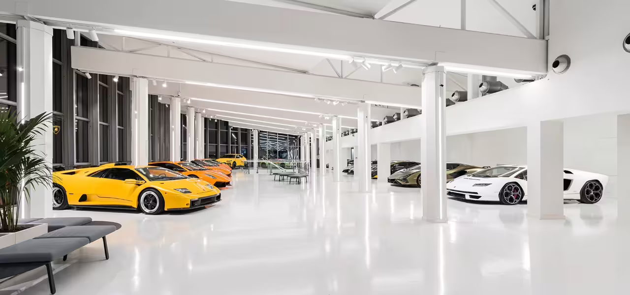 Lamborghini Museum Bologna entry showcasing iconic supercars in the modern showroom, Italy motor tour