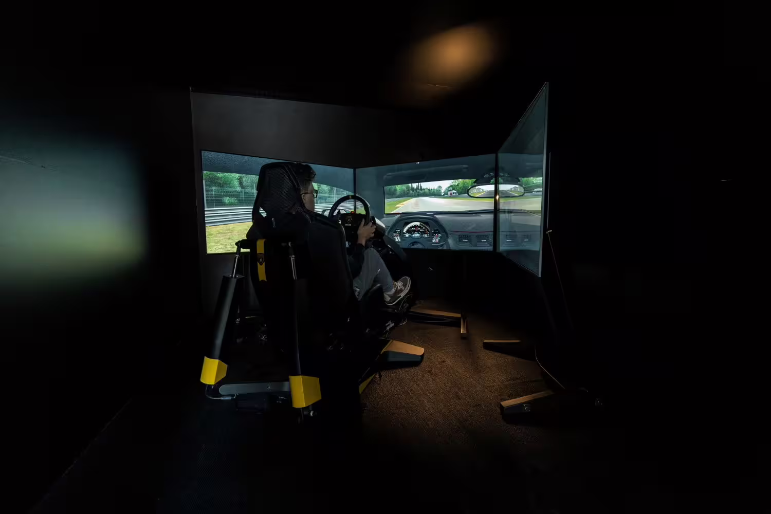 Immersive Lamborghini driving simulator experience at the Museo Lamborghini, showcasing realistic virtual racing.