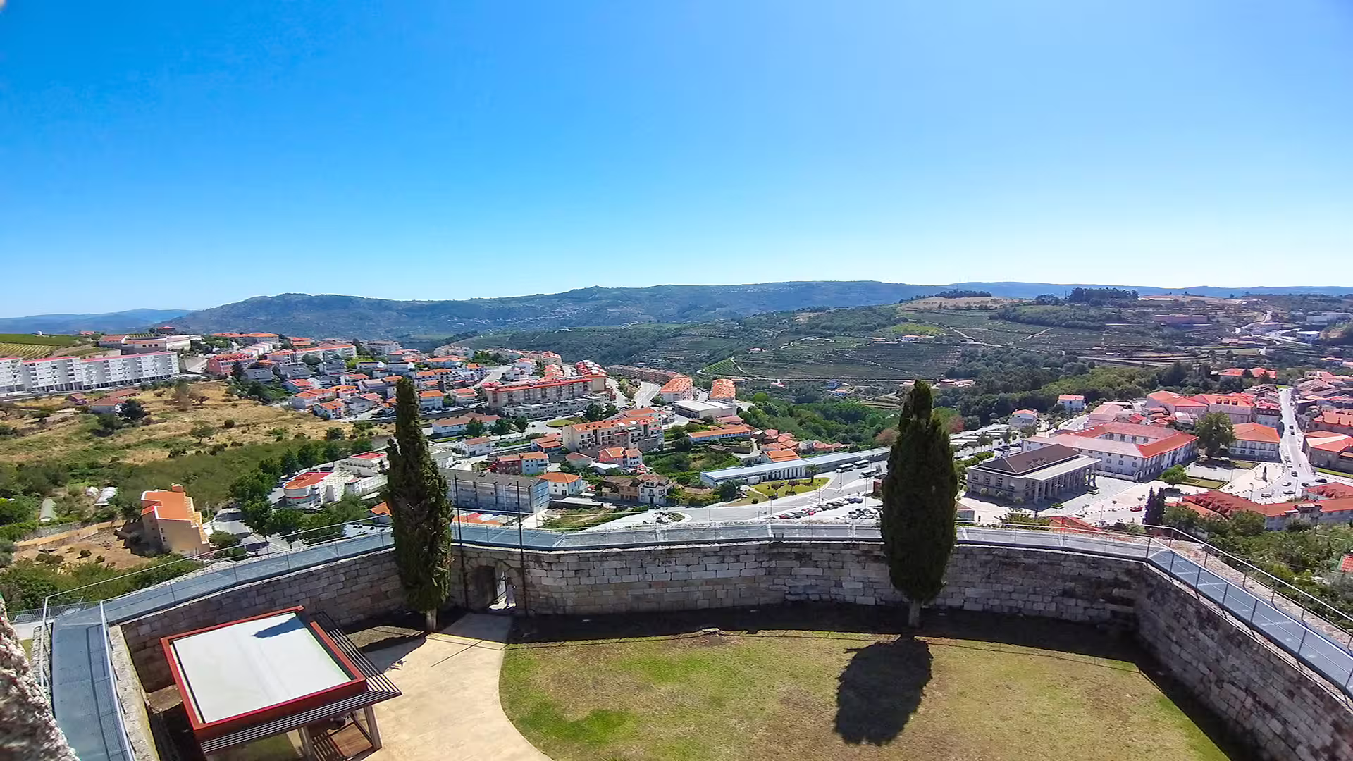 Scenic view of Lamego cityscape and surrounding vineyards in the Dão wine region, highlighting the charm of Portugal's countryside.