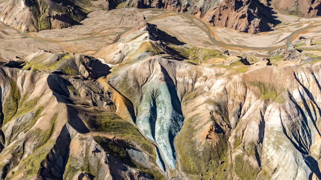Aerial view of colorful rhyolite mountains and glacial valleys in Landmannalaugar, Iceland