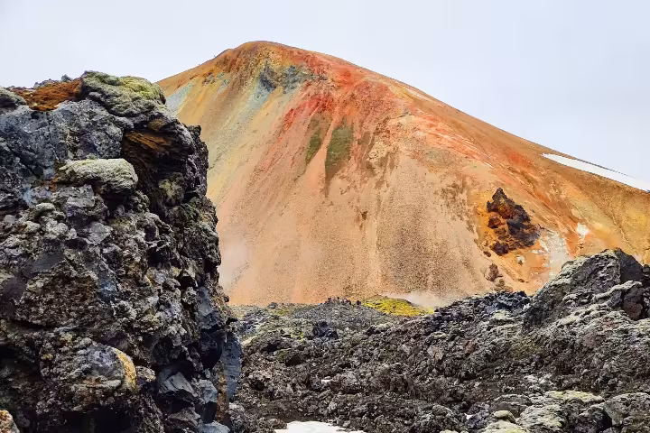 Colorful rhyolite mountain with orange and red volcanic slopes at Landmannalaugar Iceland