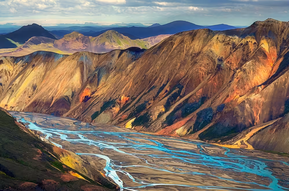Colorful rhyolite mountains and braided glacial river valley in Landmannalaugar Highland Iceland