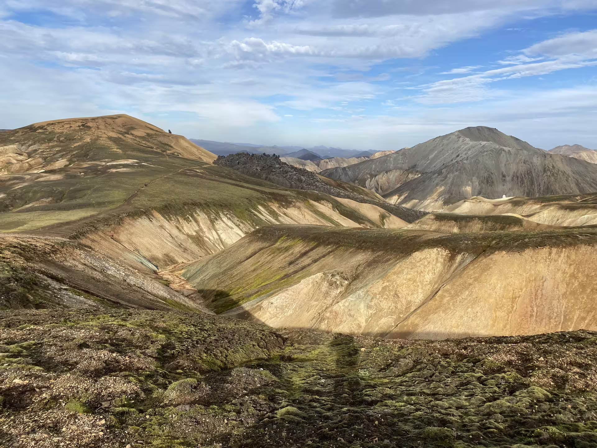 Colorful rhyolite mountains and moss-covered lava fields in Landmannalaugar highlands, Iceland
