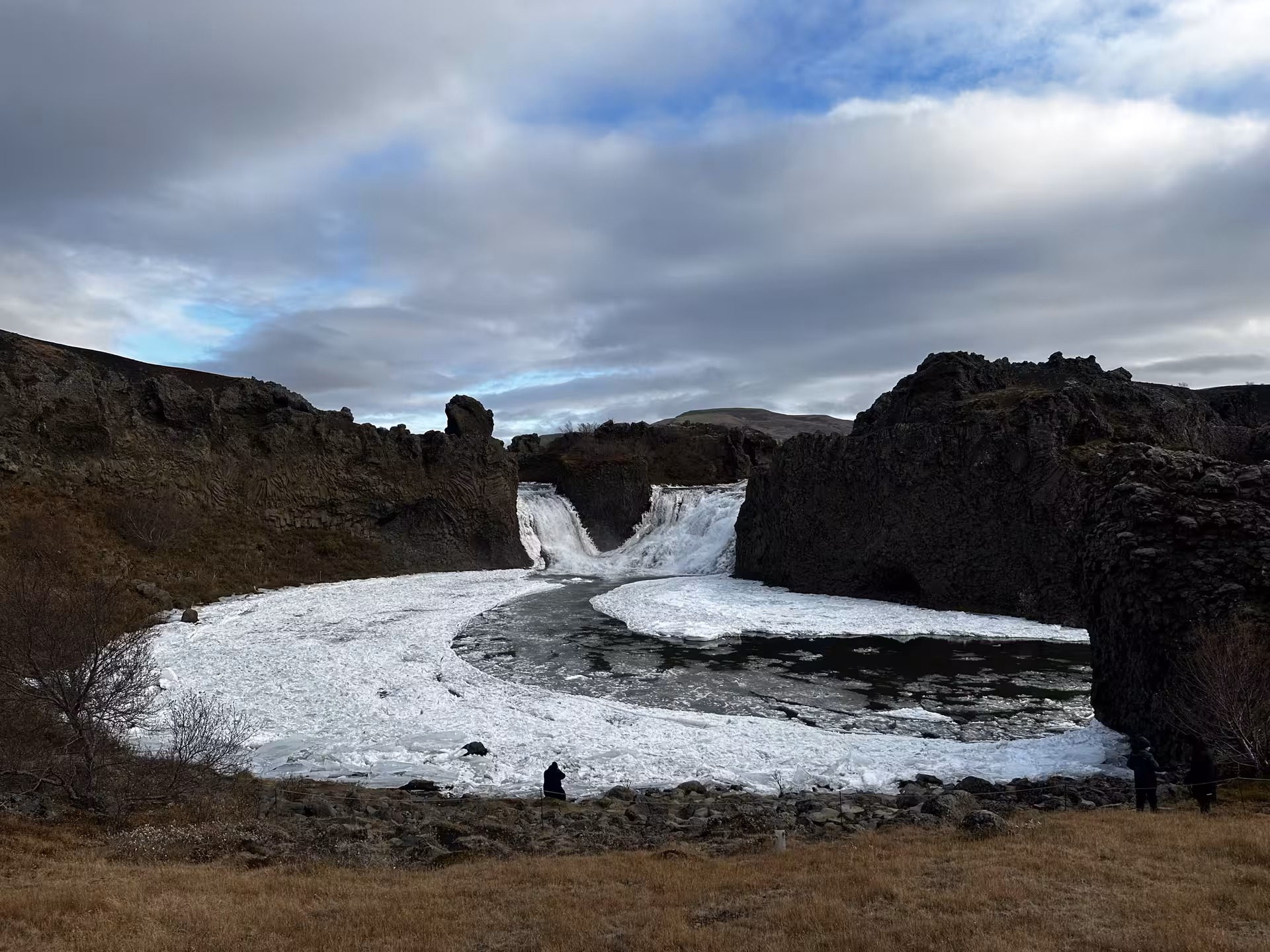 Frozen waterfall and icy river canyon on a Landmannalaugar Super Jeep Tour in Iceland