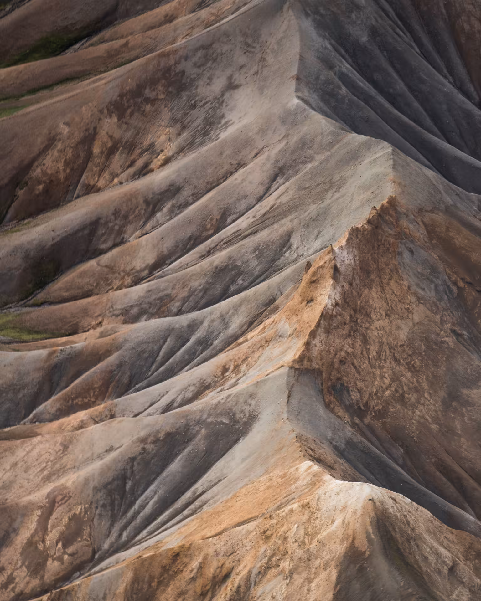 Aerial view of colorful rhyolite mountains at Landmannalaugar Iceland with layered ridges