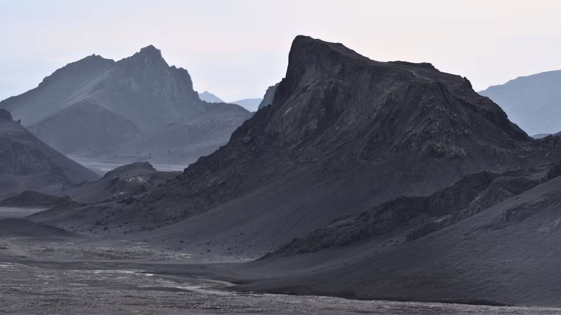 Rugged volcanic mountains near Langjökull on the Summer Solstice tour from Gullfoss, scenic Iceland highlands
