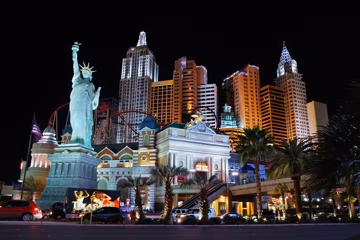 New York New York Hotel and Casino lit up at night on the Las Vegas Strip with Statue of Liberty replica