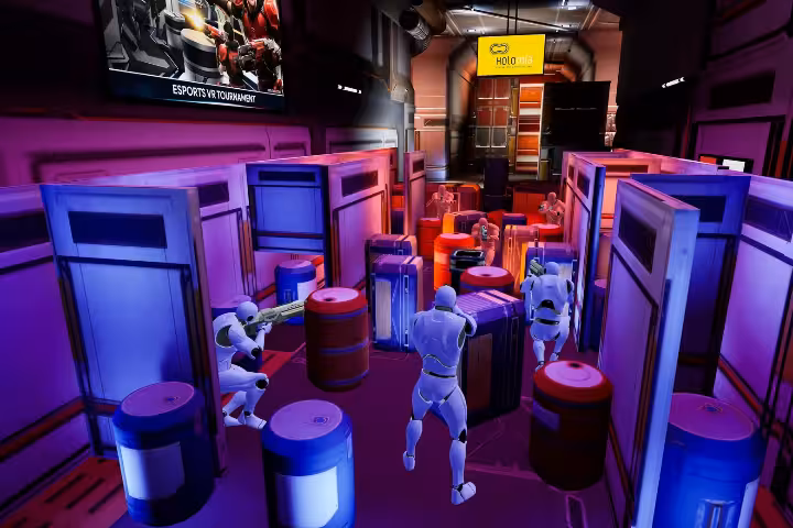Laser Game VR 18 arena with neon cover obstacles and players in a futuristic VR laser tag esports match