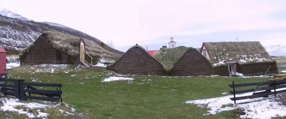Traditional Icelandic turf houses with grass roofs at Laufas Museum near Akureyri in winter