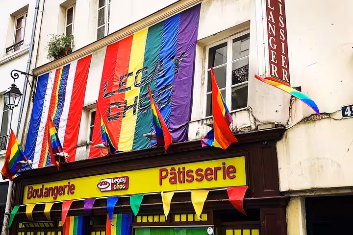 Rainbow Pride flags decorating Legay Choc boulangerie patisserie in Le Marais, Paris
