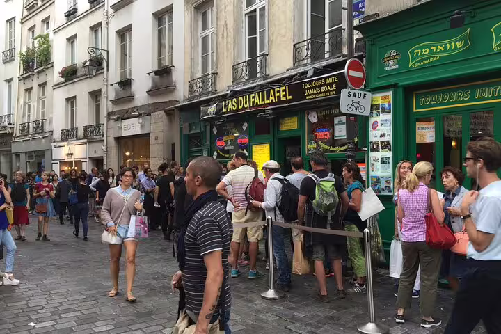 Crowd of tourists queuing outside L'As du Fallafel restaurant in Le Marais district, Paris