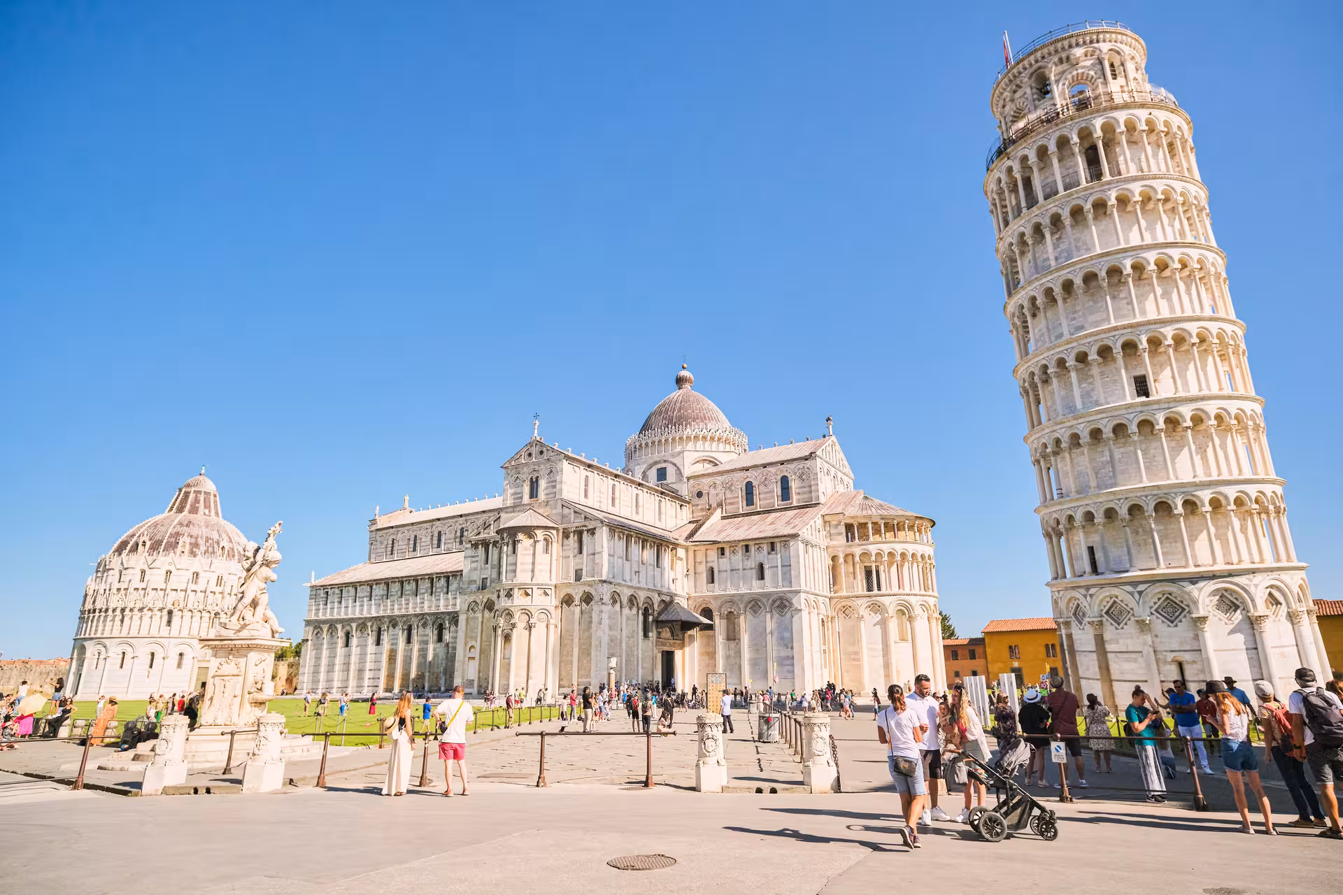 Visitors enjoy a view of the Leaning Tower and Pisa Cathedral on the Piazza dei Miracoli tour.
