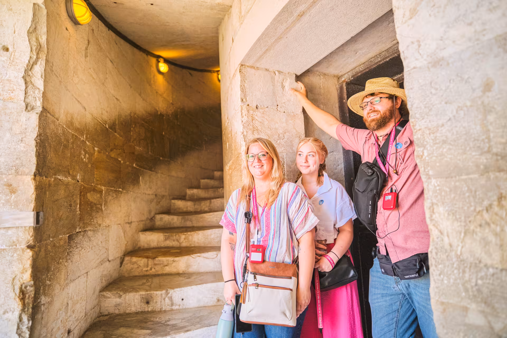 Tourists exploring the interior of the Leaning Tower of Pisa during a half-day shore excursion from Livorno.