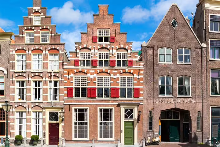 Historic Leiden gabled houses and Pieterskerk area, stop on a self-guided GPS walking tour in Leiden