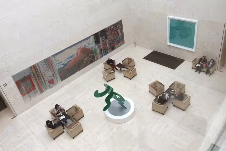 Modern art installations and seating area in the Leopold Museum atrium, perfect for a private art historian tour.