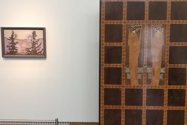 Exquisite Viennese Art Nouveau paintings and woodwork display at the Leopold Museum on a guided art historian tour.