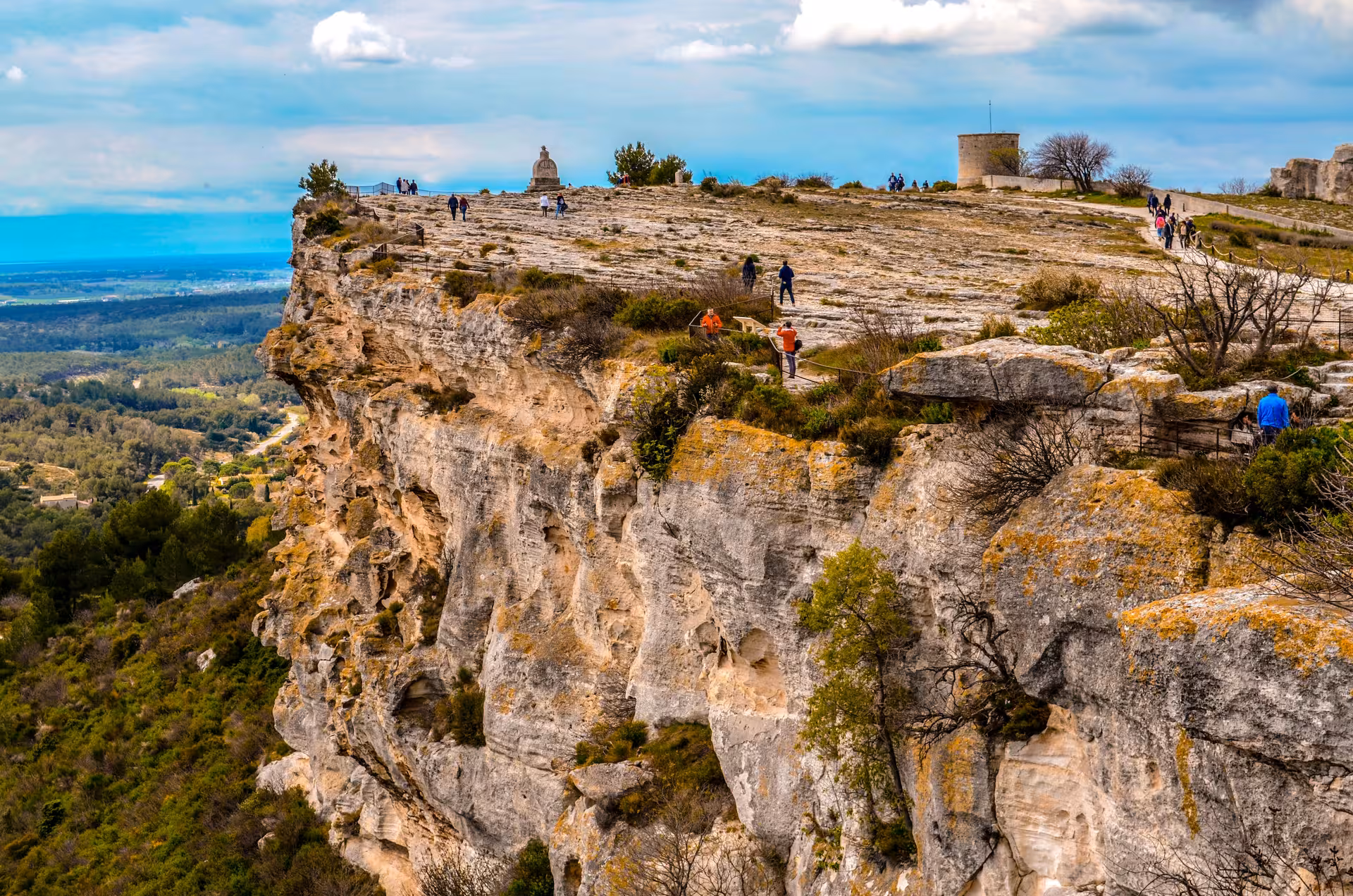 Panoramic cliff view from Les Baux-de-Provence, scenic stop on Arles day trip and Provence lifestyle tour