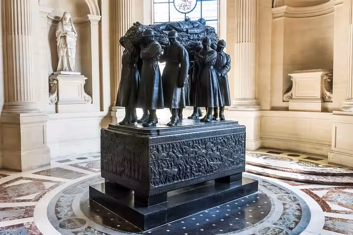 Les Invalides Paris monument in Napoleon’s Tomb tour, bronze funeral sculpture in the domed chapel