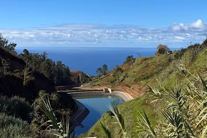 Levada reservoir in southwest Madeira with Atlantic views on a cultural and geological 4x4 adventure tour