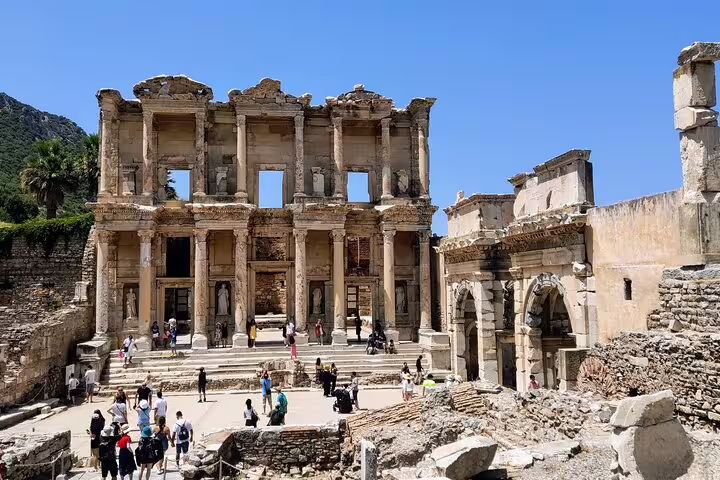 Library of Celsus in Ephesus with visitors, key stop on 8-day Istanbul Cappadocia Konya Pamukkale tour
