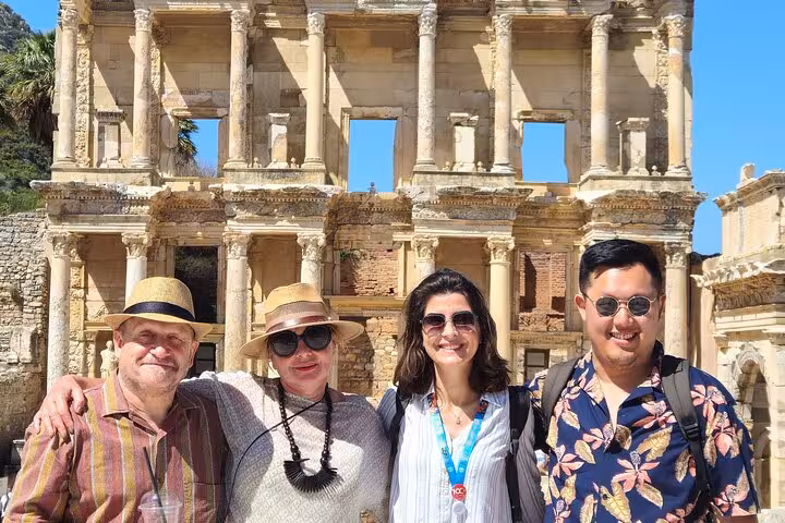 Visitors posing at Library of Celsus in Ephesus on 3-day Istanbul to Ephesus, Pamukkale, Priene and Miletus tour
