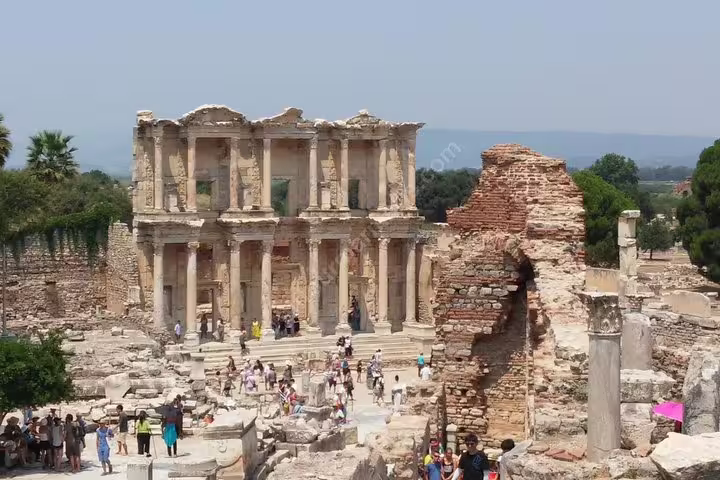 Library of Celsus facade with visitors at Ephesus ruins, popular stop on Izmir Cruise Port shore excursion