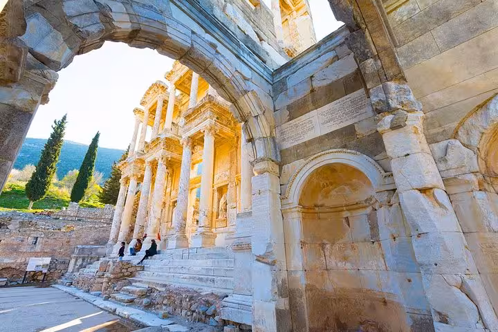 Library of Celsus facade framed by ancient arch in Ephesus, highlight of Izmir Airport day tour