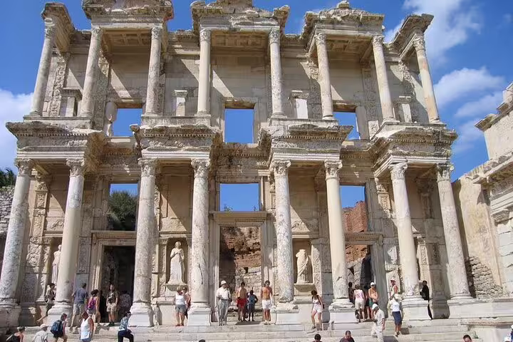 Library of Celsus facade in Ephesus with visitors, key stop on 3-day mini group tour from Kusadasi