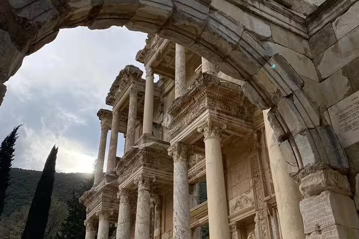 Archway view of the Library of Celsus columns in Ephesus on a private less walking tour, Turkey