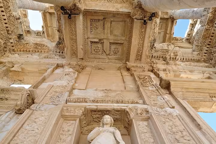 Intricate carvings on the Library of Celsus façade in Ephesus, highlight of the Ephesus and Pamukkale tour